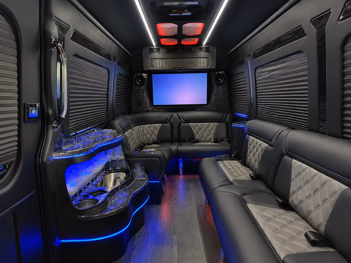 corporate airport transfer buses between arvada and denver international